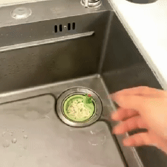 Cactus sink strainer press to dump design